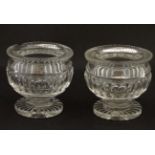 A pair of cut glass pedestal salts.