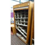 large tambour front cabinet CONDITION: Please Note - we do not make reference to