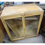 Glazed display cabinet with pull out slide c1950.