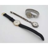 Three watches ,9 ct Gold , Silver and Stainless Steel cased : a gentleman's .