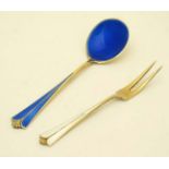 Scandinavian silver : A silver gilt spoon with blue guilloché enamel decoration together with a