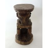 An ethnographic African native tribal carved wooden stool 14 1/2" high CONDITION: