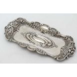 A silver small tray / pin dish hallmarked Birmingham 1906 maker William Devenport.