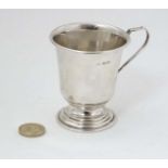 A silver Christening mug hallmarked Birmingham 1955 maker B & Co.