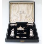 A cased 5 piece cruet set comprising pair of salts,