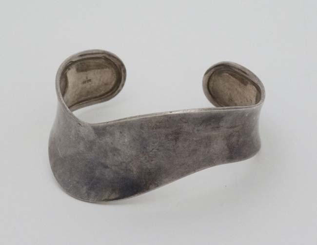 A silver bracelet of bangle form CONDITION: Please Note - we do not make reference - Image 3 of 6