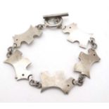 A silver an white metal bracelet ,