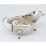 A silver sauce boat hallmarked Sheffield 1933 maker Viners Ltd.