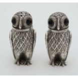 A 21stC novelty .800 white metal salt and pepper cruet formed as owls.