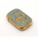 A vesta case with gilt and enamel decoration in the Scandinavian style. Indistinctly marked.