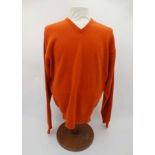 Laksen orange jumper, 65% merino, 27% nylon, 5% cashmere and 3% spandex,