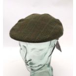 A Laksen ' Bruar ' Tweed Sixpence Flat Cap, Size 57''.