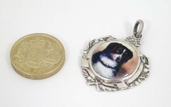 Dog Interest : A hallmarked silver fob with later applied ceramic cabochon depicting the head of a - Image 3 of 3