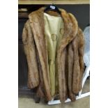 Fur coat This lot is being sold for our nominated charity for the year The Medical Detection Dogs,