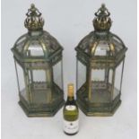 A pair of hexagonal formed lanterns with glass panels approx ( late 20thC / 21stC ) 25" high.