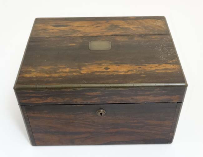 A 19thC ladies Coromandel vanity box opening to reveal a fold down front with satinwood drawers and - Image 2 of 8
