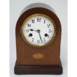 Junghans Arch cased mantle clock : an 8 day plated pendulum clock , striking on a coiled gong,