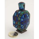 An enamel and cloisonne decorated snuff bottle on a white metal foot 3" high CONDITION: