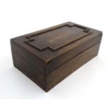 An early 20thC oak box with geometric moulding to top marked ' John ... 1914' within.