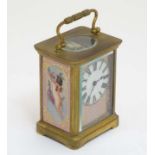 Carriage Clock : a porcelain panelled 5 1/4" high ( handle up) carriage clock ( timepiece ) with