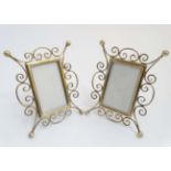 A pair of Victorian brass easel / strut photograph frames 6 1/2" high CONDITION: