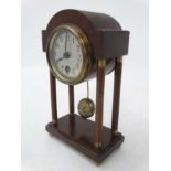 Early- mid 20thC mahogany Portico Clock : the case with brass ended turned columns ,