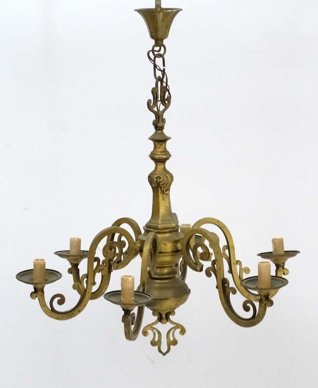 An early 20thC brass squared 6-branch pendant electrolier.