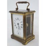 French alarm Carriage Clock : a 5 bevelled glass brass cased Carriage Clock with French movement ,