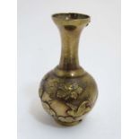 A 19thC Japanese small vase with relief decoration standing 4 3/4" high CONDITION: