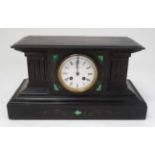 Malachite and slate mantle clock : a XIX 8 day clock with Japy Freres Movement striking on a bell ,