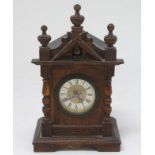 Oak cased Cuckoo mantle Clock : a German made 2 3/4" dial mantle clock with two bellows and moving