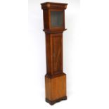 An c.1800 walnut stained oak longcase with mahogany cross banding and hood.