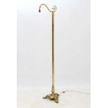 An early - mid 20thC brass standard lamp / reading lamp with swan neck arm,