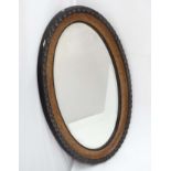 1930s oval Mirror with horseshoe decoration CONDITION: Please Note - we do not