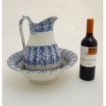 A 19thC English blue and white Spongeware jug and bowl set. The jug 11 1/4'' high .