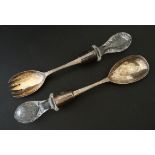 A pair of silver plated salad servers by Kemp Brothers with cut glass handles 10 1/2" long