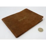 An early 20thC Autograph album containing rhymes, good wishes and signatures between 1917-1923,