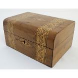 A 19thC ladies semi-domed sewing box with banded decoration and lift out tray.