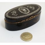 A 19thC tortoiseshell silver inlaid hinged lidded box with silver gilt facings.