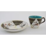 A late 19thC Wedgewood Majolica Argenta 'Fan' pattern Cup & Saucer ,