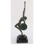 Ramonde Guerbe (XX), An Art Deco patinated Bronze, 'Fanfare Dancer',