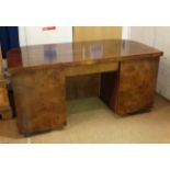 Art Deco : a Walnut office desk ( for looking into room ) , with curved front ,