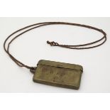Militaria : A Trenchart brass vesta / card case and carrying chain , the front stamped ' N . A . D .