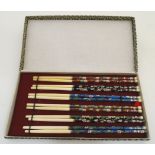An early 20thC set of ivory and Cloisonne decorated Chinese chopsticks ( 6 pairs) approx 8 1/2"
