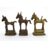 3 various brass models of horses with traces of gilt, on raised plinths.