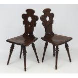 A pair of late 19thC spruce pine hall chairs 37 1/2" high CONDITION: Please Note -
