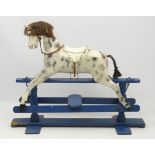 A mid 20thC Dapple Grey Rocking Horse in the style of J & G Lines, London ,