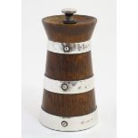 Pepper mill / Grinder : An oak pepper grinder formed as a milk churn with banded silver decoration,