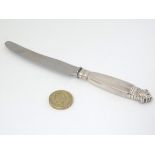 Georg Jensen : A Danish silver handled Acanthus / Dronning pattern knife 6 3/4" long