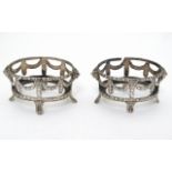 A pair of Continental silver table salt frames with lions mask, harebell and swag decoration ,